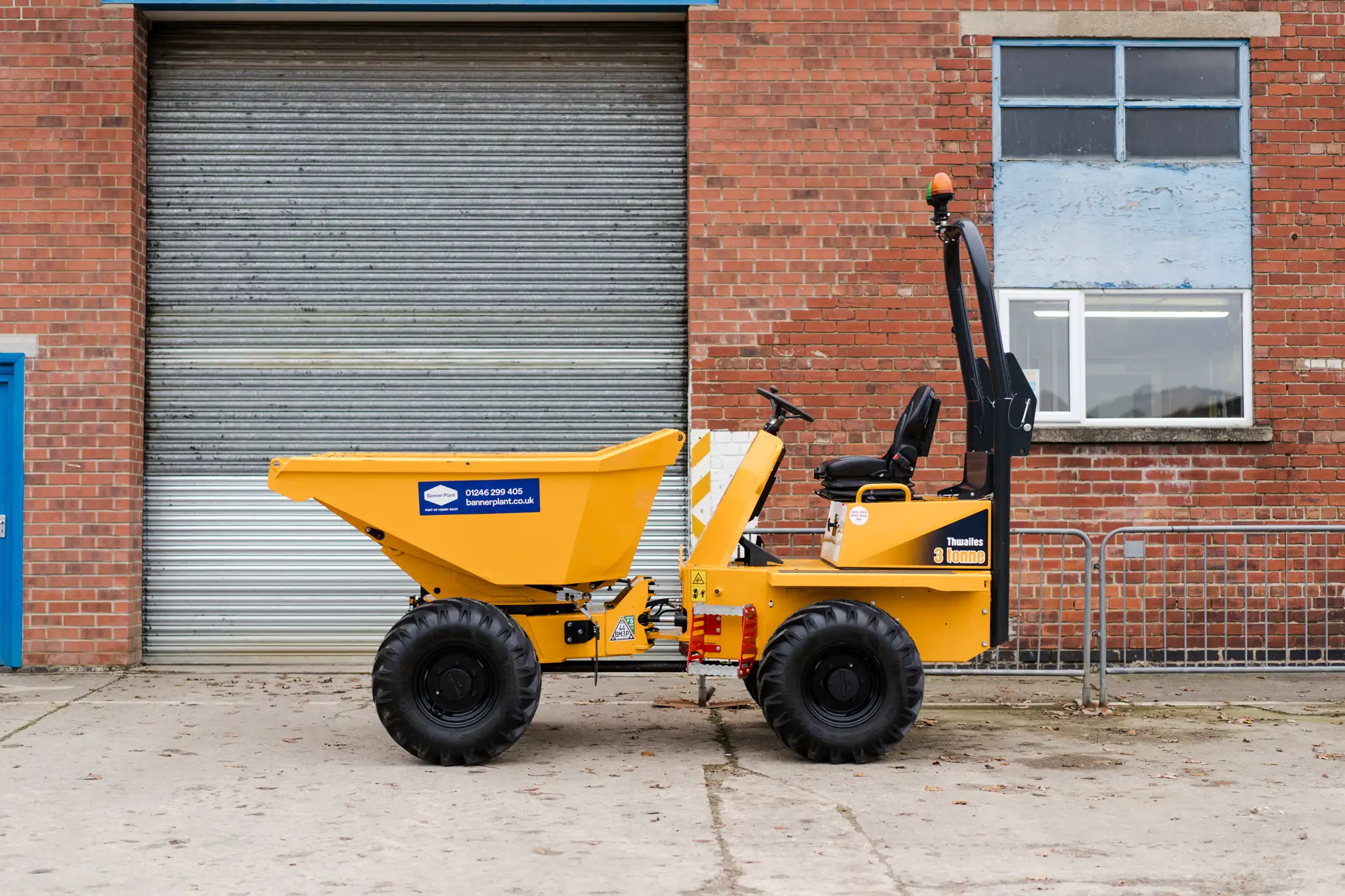 Swivel skip dumper on site