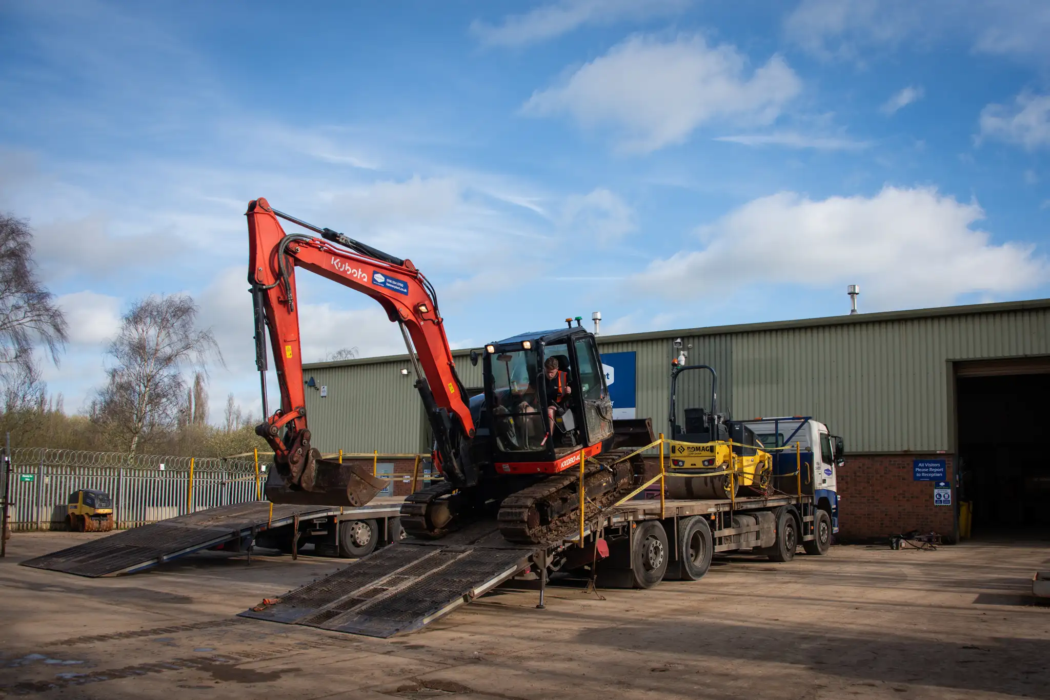 Banner Plant Leicester yard with excavator on flatbed